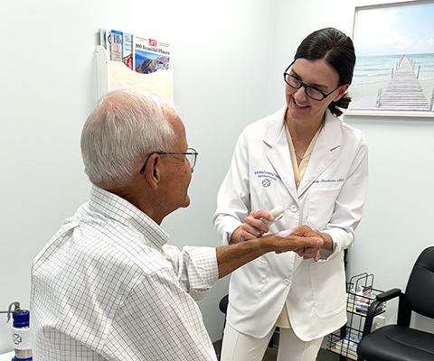 Dr. Patty Perschbacher checking a patient